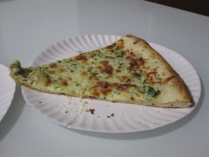 This is a slice of the famous Spinach Pizza